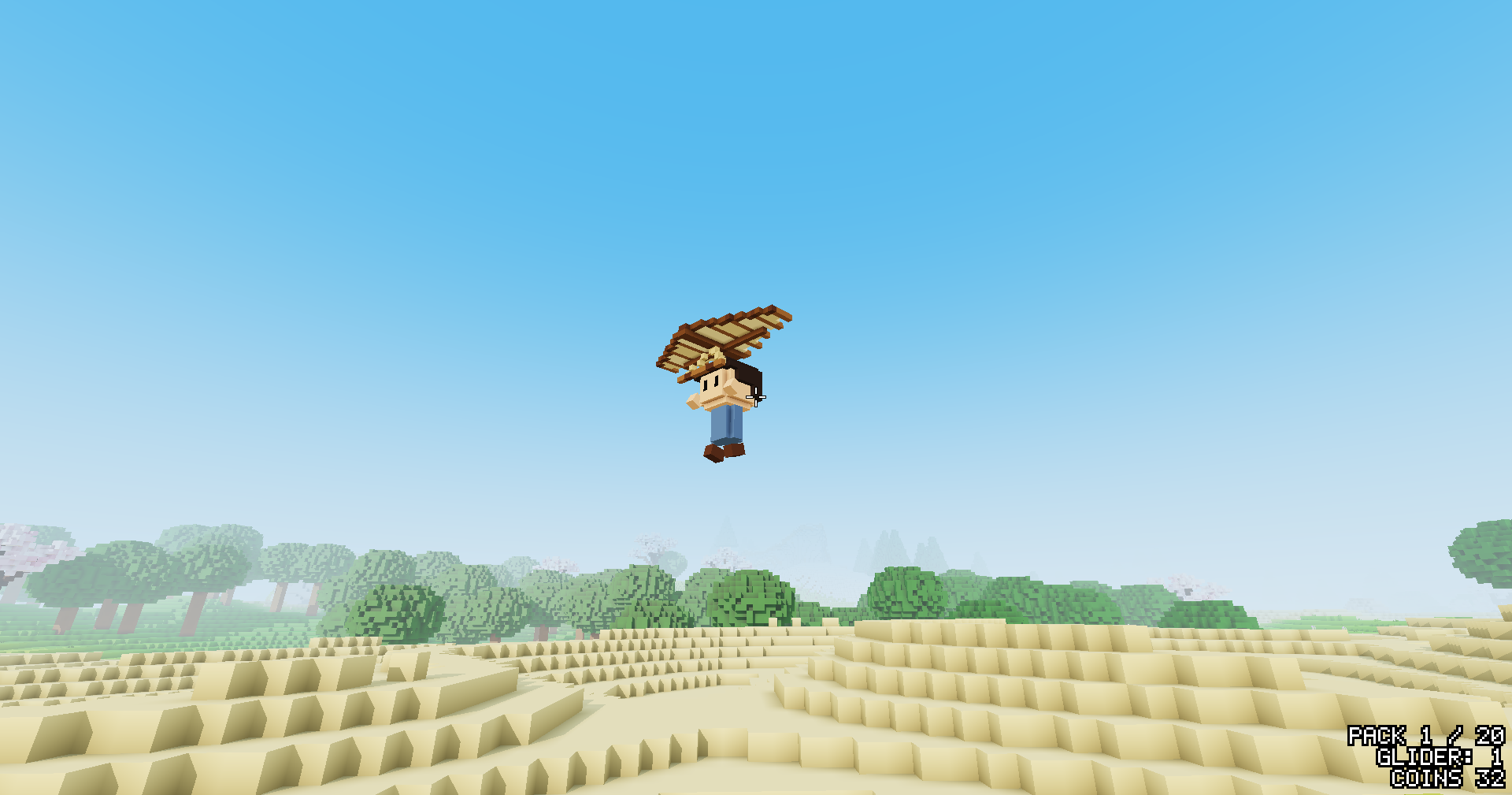 The player gliding side-on under the open glider against a clear blue sky, low over sandy terraces, with trees on the horizon.