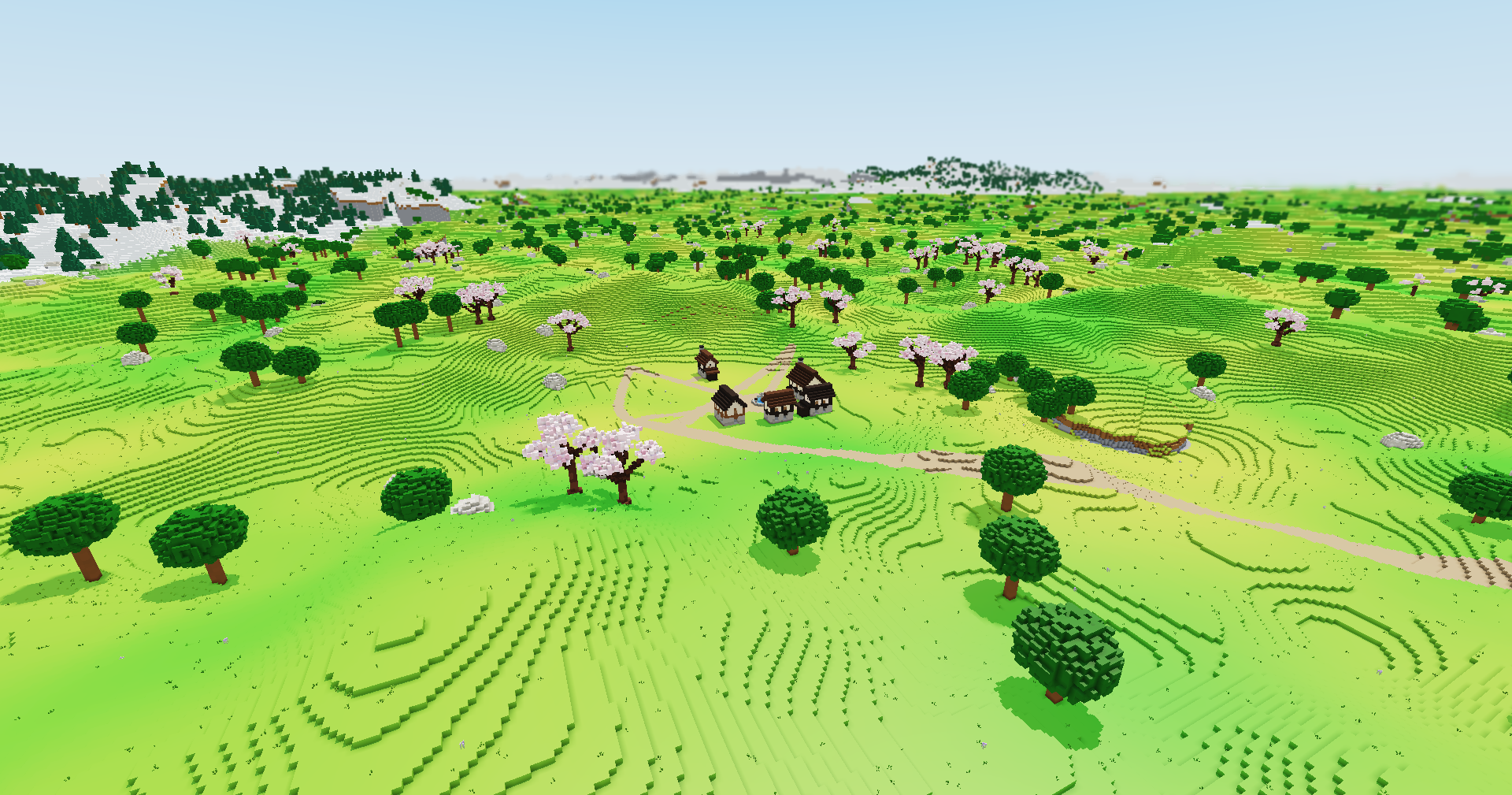 Seen from above, a small town of timbered houses among oaks and sakura trees on rolling grassland, a road leading out of it, with hills and snowy land far behind.